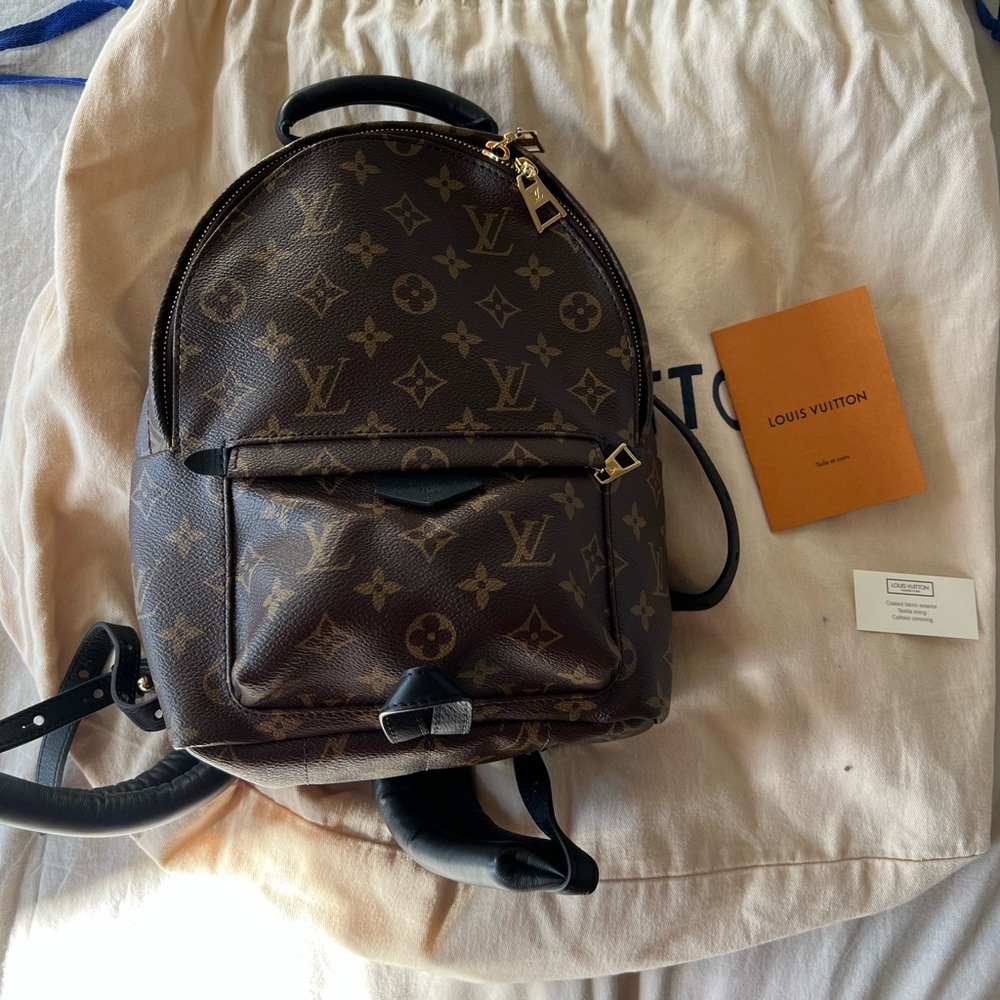 Authentic Louis Vuitton Palm Springs MM backbag. In Pristine Condition.
